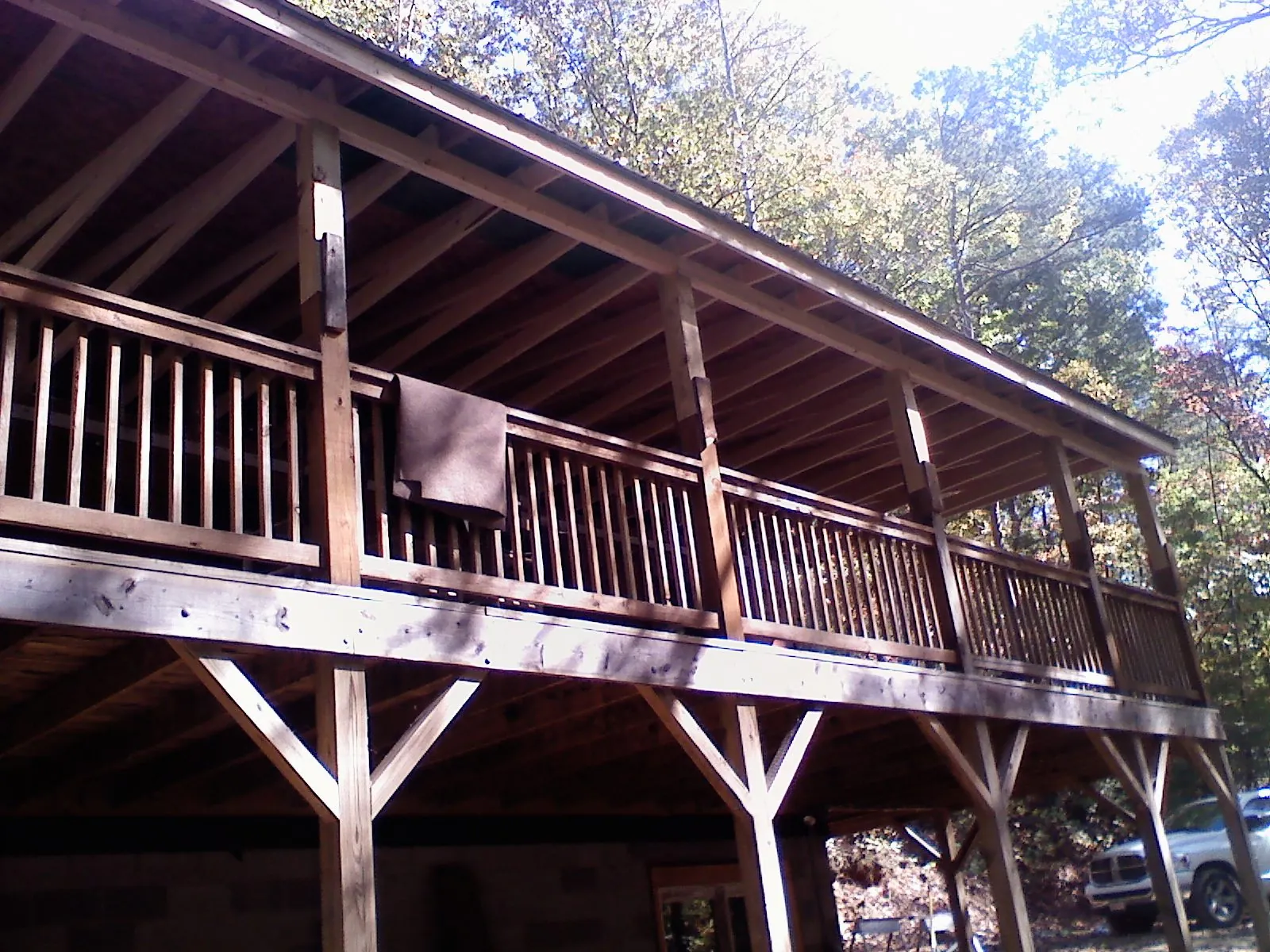 Timber framing under a new elevated porch and deck — Roof Leak Repair in Mount Freedom by Roofing Brothers